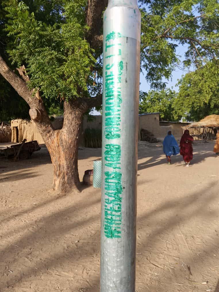 Whitesands Agro sustainability project marker installed in farming community