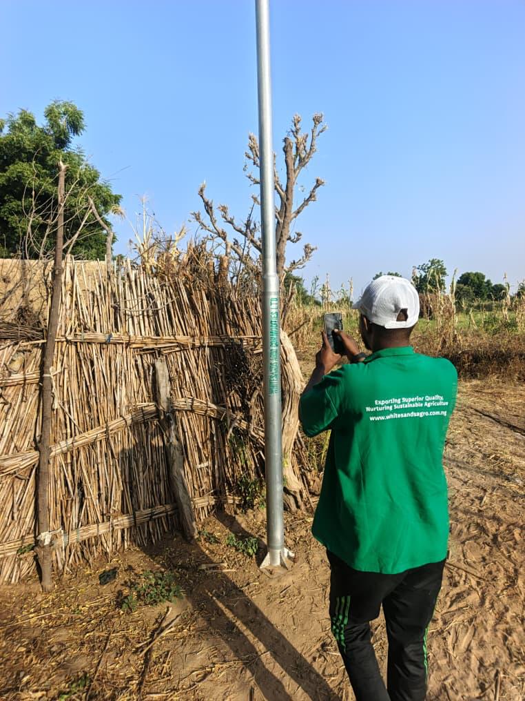 Whitesands Agro field officer documenting an outgrower farm in Northern Nigeria